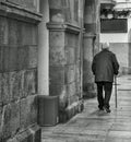 Old man walking with a slow step